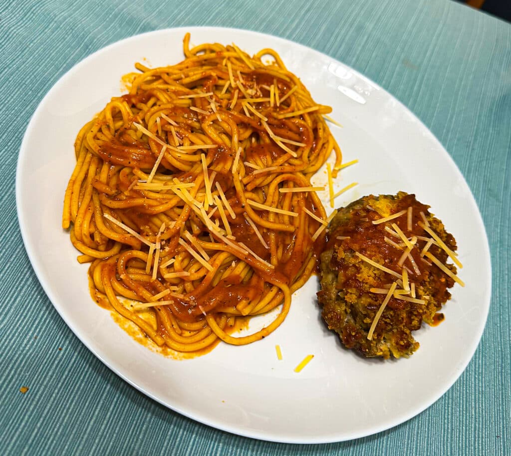 Plated Pork Meatloaf Parm over Spaghetti Marinara