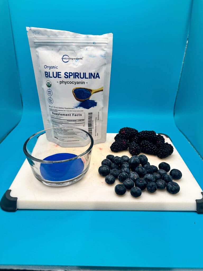 Blackberries, blueberries, and blue spirulina powder